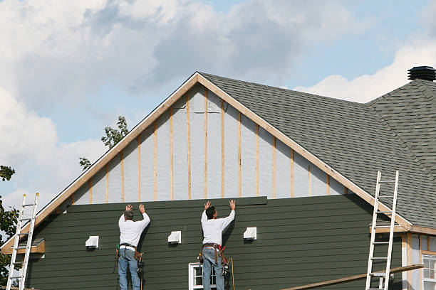 Professional Siding technician working in Antioch, IL